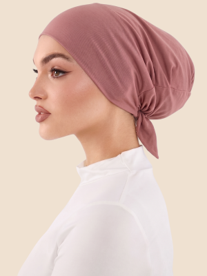 Ragazza con undercap hijab rosa scuro