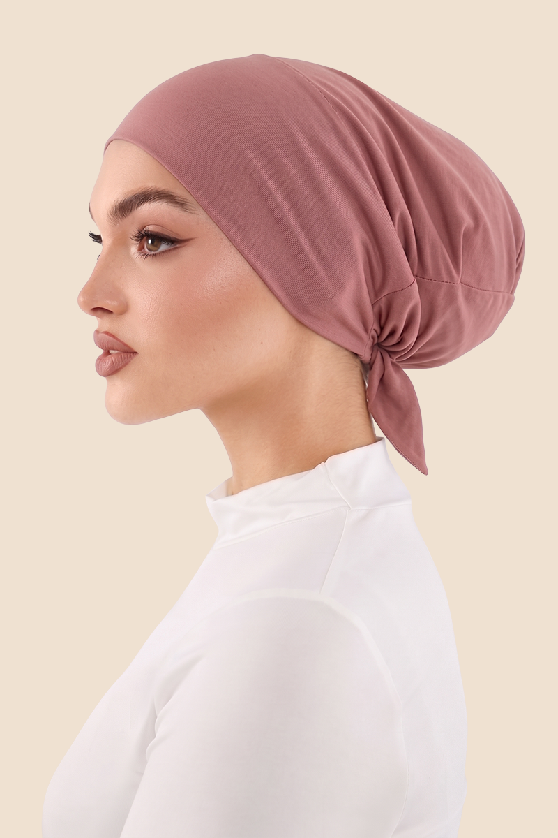 Ragazza con undercap hijab rosa scuro